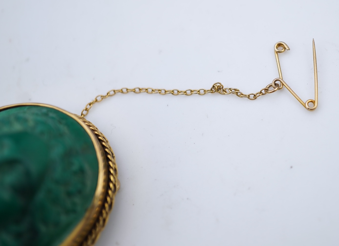 A malachite cameo brooch, mid 19th century